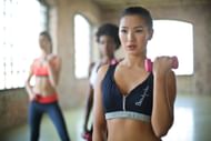 Bicep curls. (Image credits: Pexels/ Andrea Piacquadio)